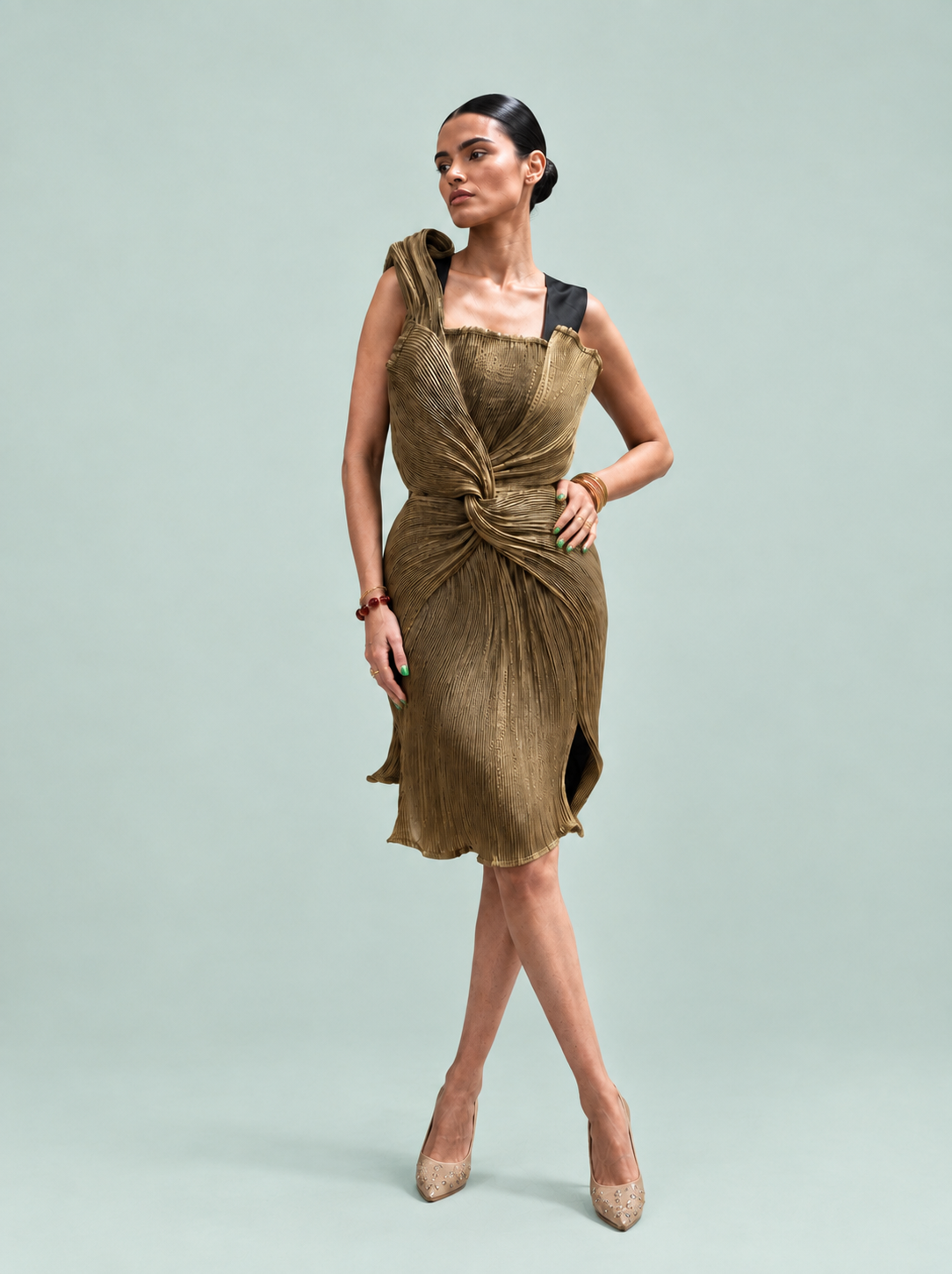 AI Gold Dress side pose — precision pleated asymmetric occasion dress Eclipse 26