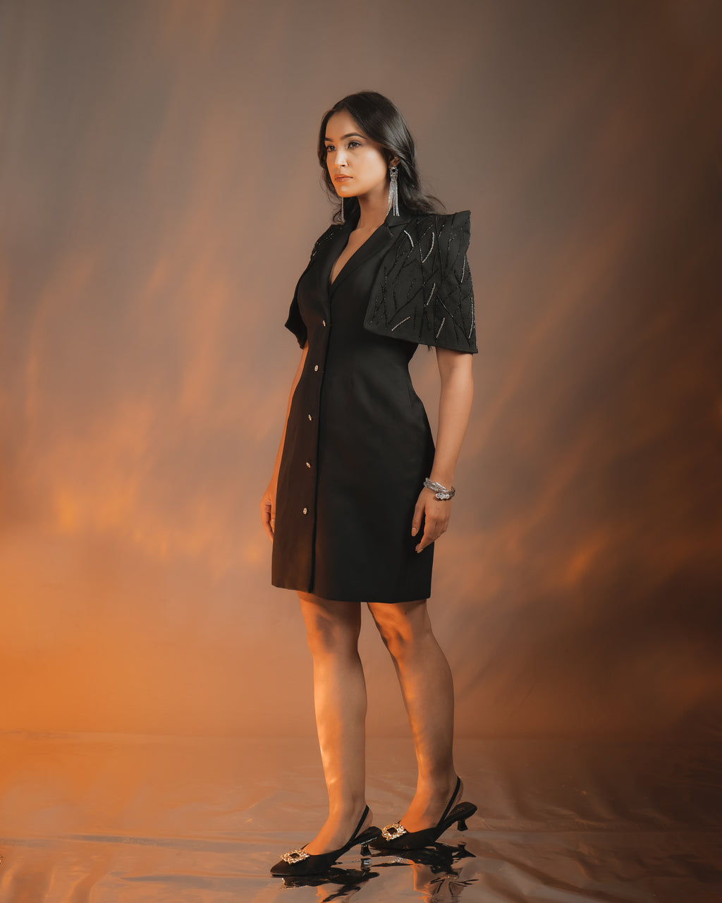 ZEN BLAZER DRESS BLACK featuring embellished cape sleeve and Swarovski Crystal button, luxury crepe fabric.
