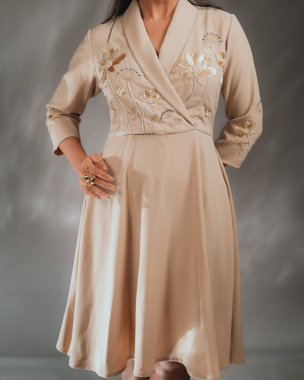 UNA SHAWL COLLAR DRESS with intricate hand embellishment and zip closure, made from heavy luxury crepe.
